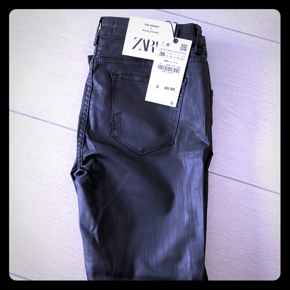 Skinny black coated jeans